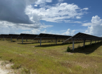 Solar panel array under clouds